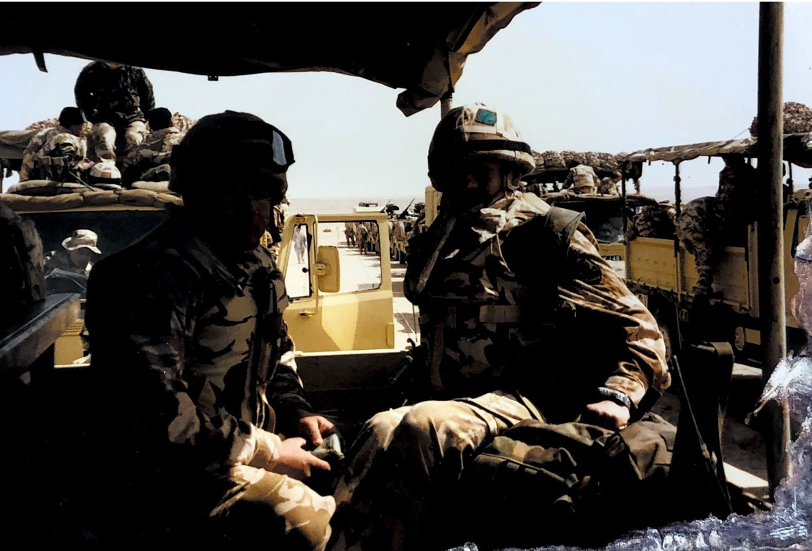 Arunhang and colleague in vehicle in Iraq