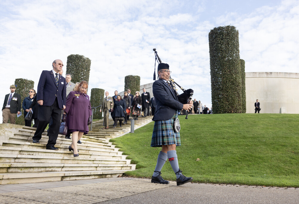 Piper leading the way to the Bastion Memorial